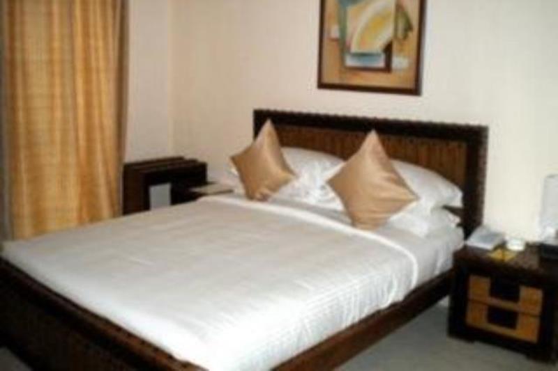 Hotel The Elite Suites Pune Habitación foto